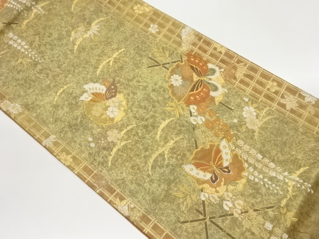 雪輪に花々・蝶模様織出し袋帯